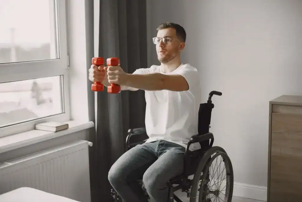Empowering Weight Loss: A Comprehensive Guide for Individuals with Disabilities 1 Image of man doing exercise in his wheelchair to aid weight loss Earl Shilton