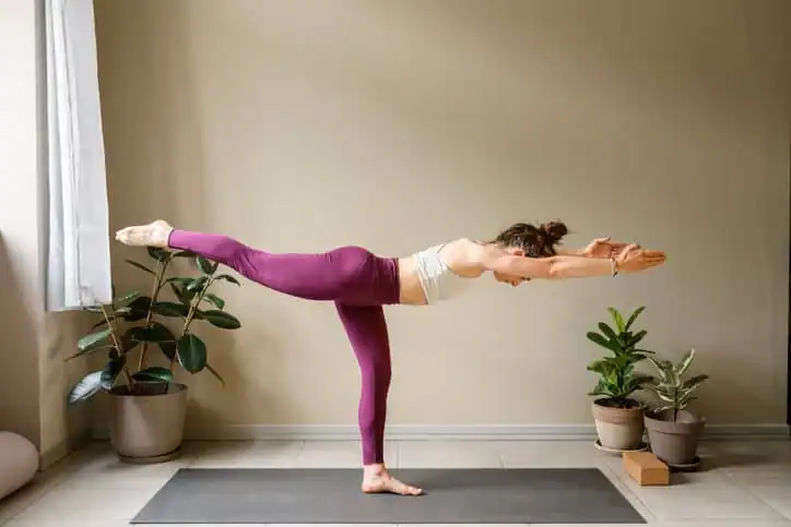 Woman doing Yoga exercise Earl Shilton to help with toning the body. 