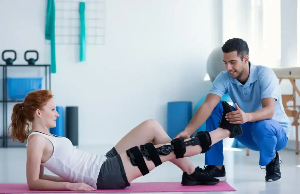 Woman having treatment to help muscle recovery Earl Shilton after an injury